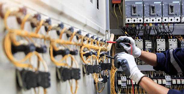 Professional Electrician technician working in Garden City, NY